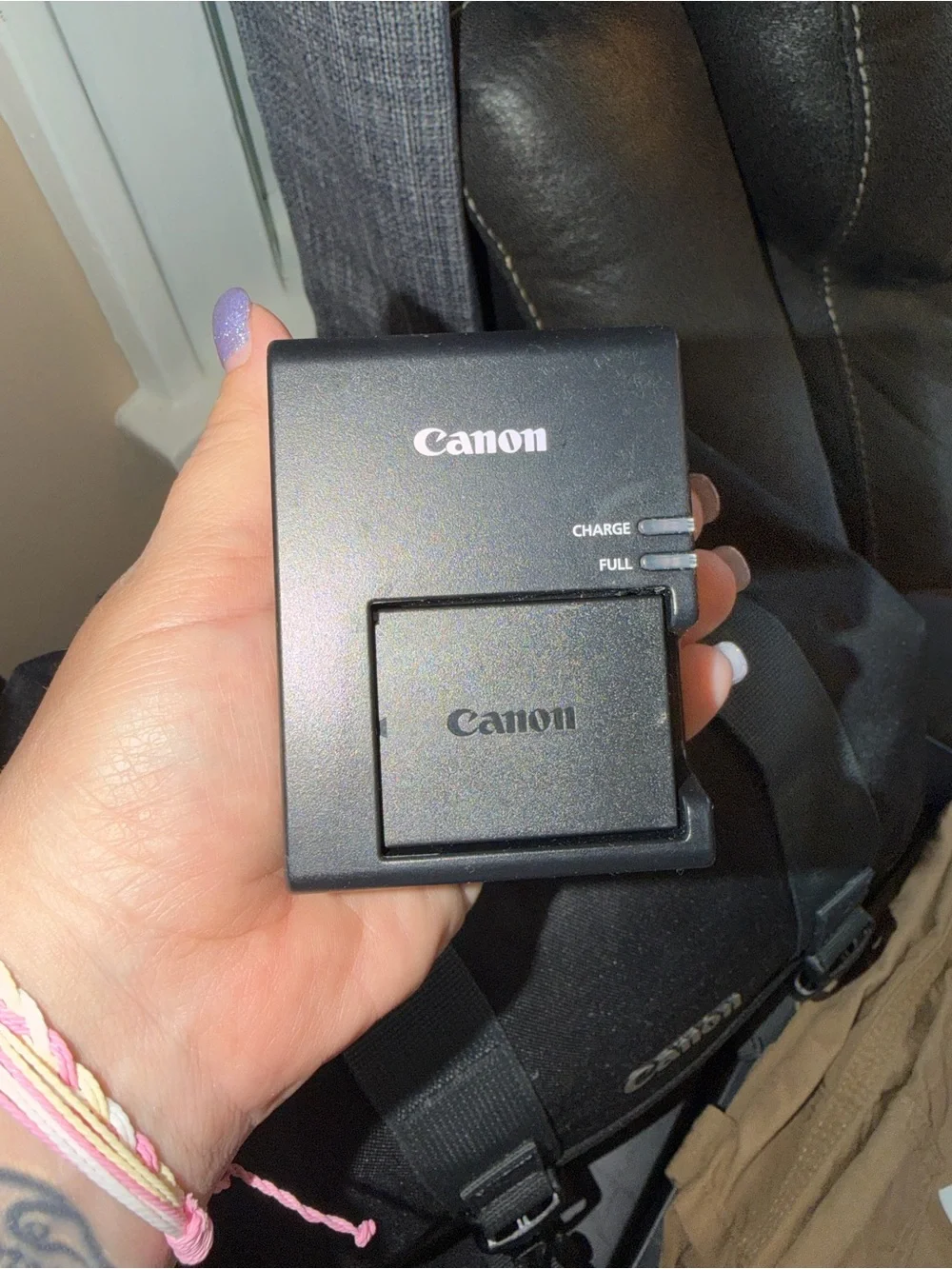 Canon Black DSLR with 18-55mm Zoom Lens
